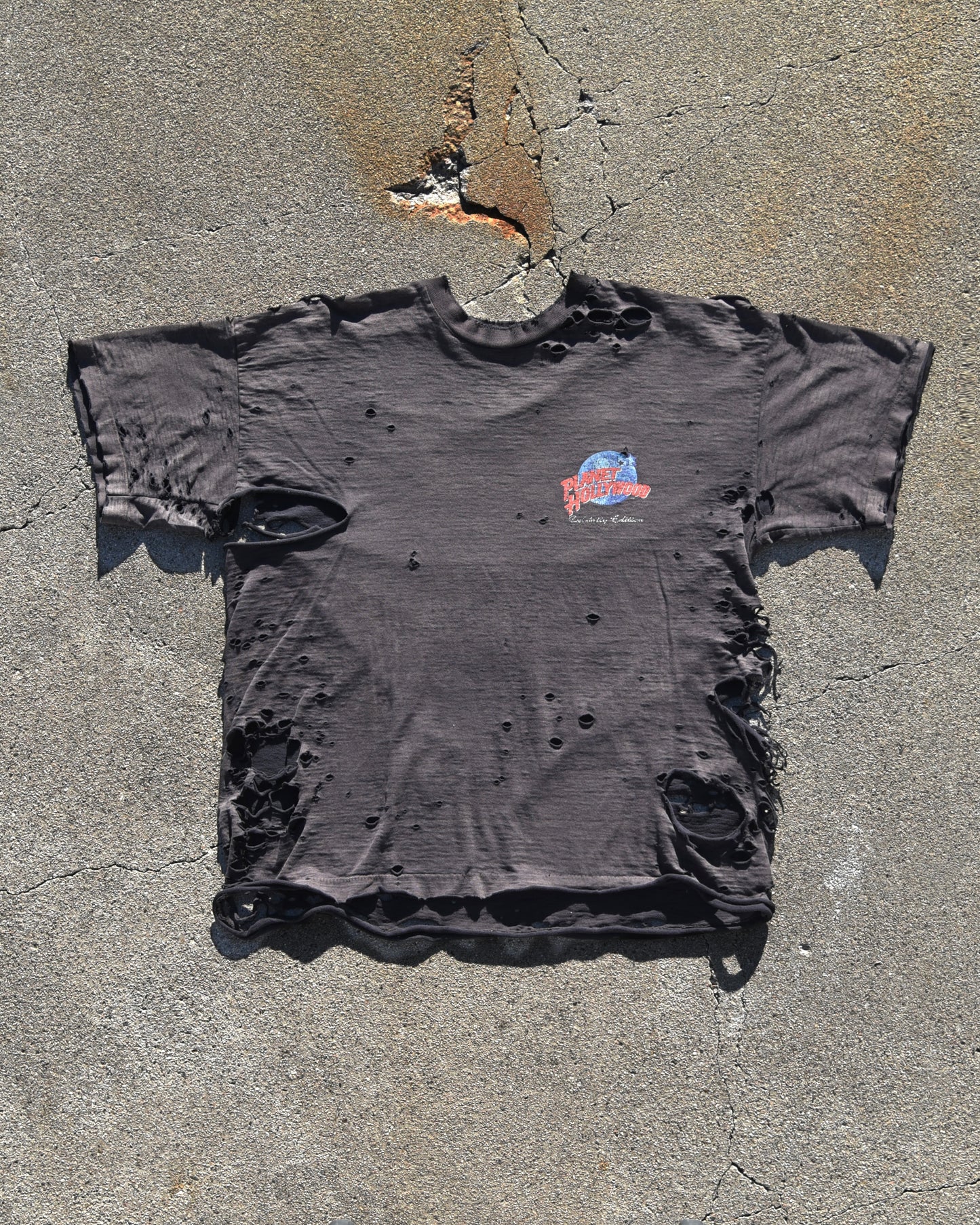 1980s Thrashed and Faded Planet Hollywood Tshirt