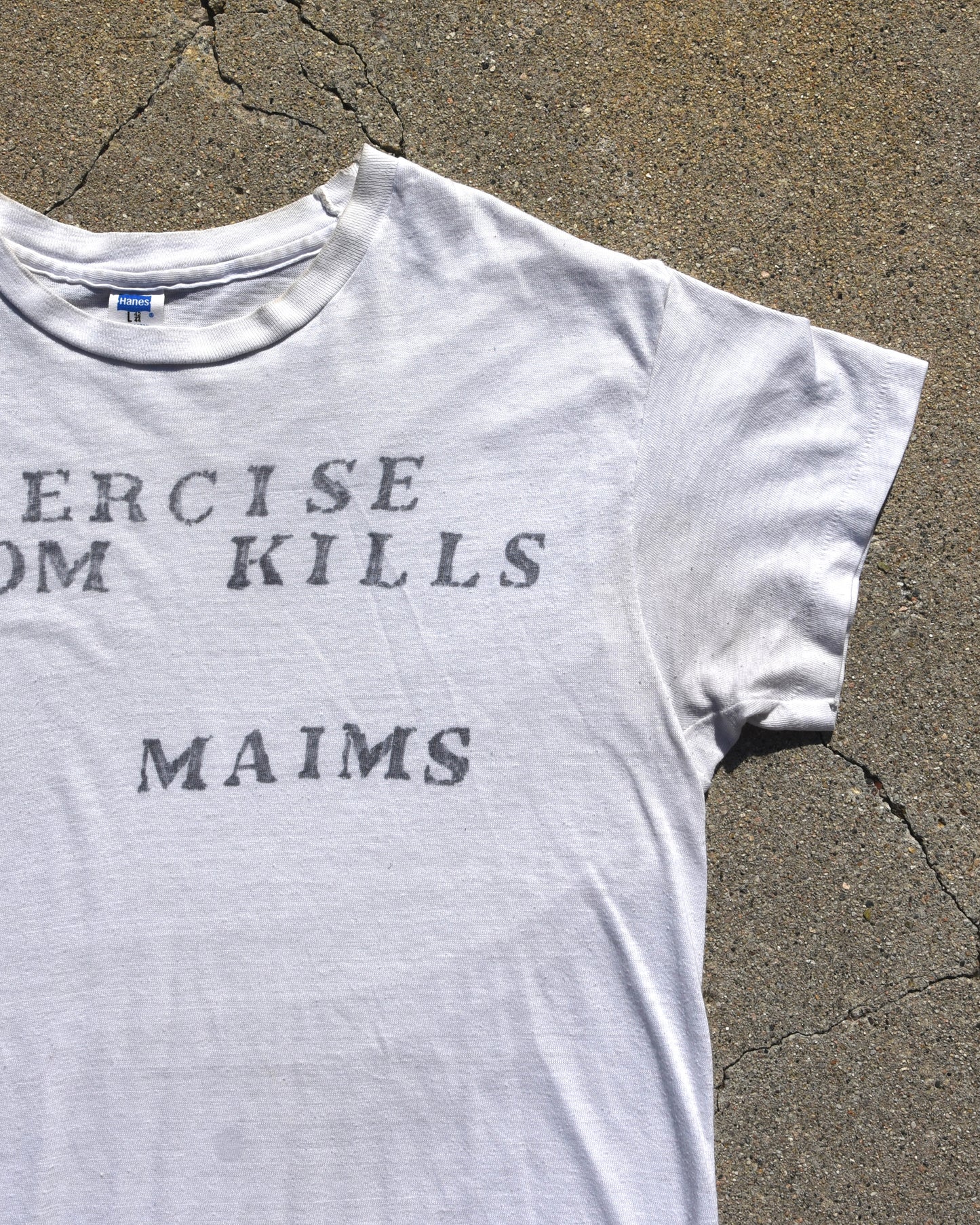 1970s Exercise Seldom Kills It Maims Tshirt