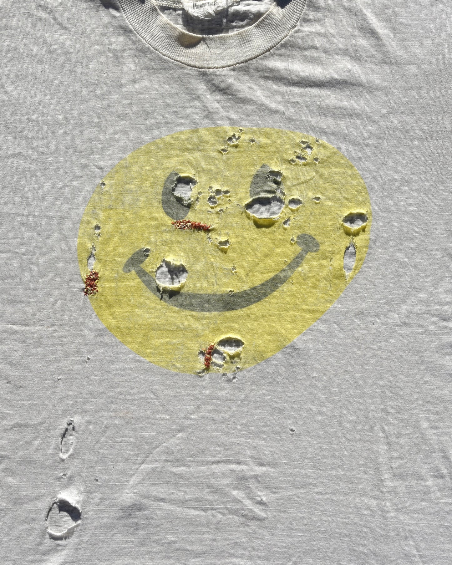1980s Thrashed and Repaired Smiley Face Tshirt