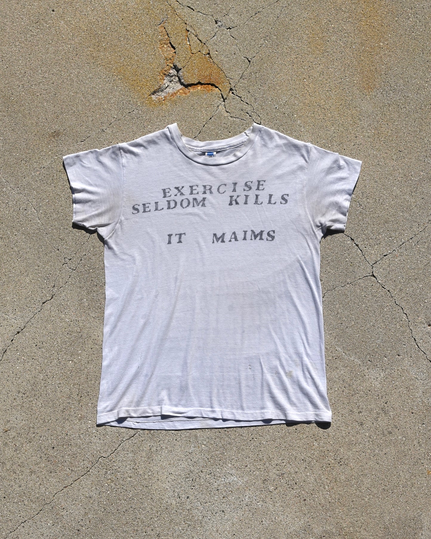 1970s Exercise Seldom Kills It Maims Tshirt
